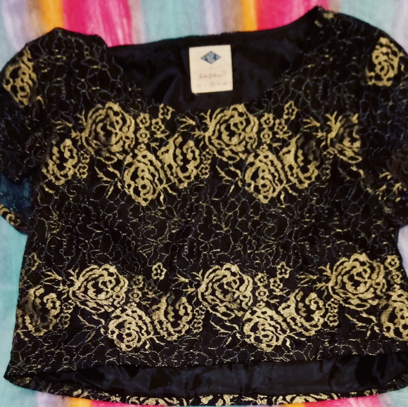 This is a lace floral gold and black crop top - Picture 2 of 3